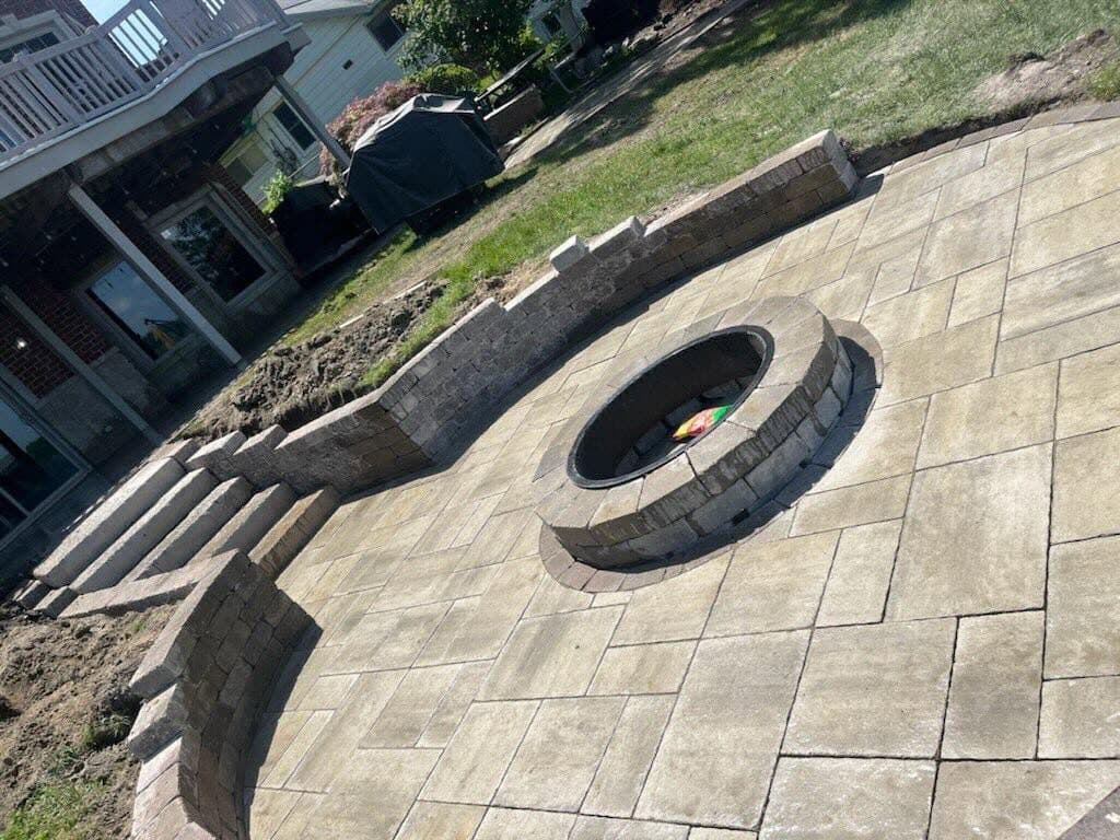 Stamped concrete patio with a fire pit